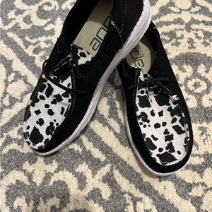 Hey Dude Black and White Sneakers with Bold Pattern